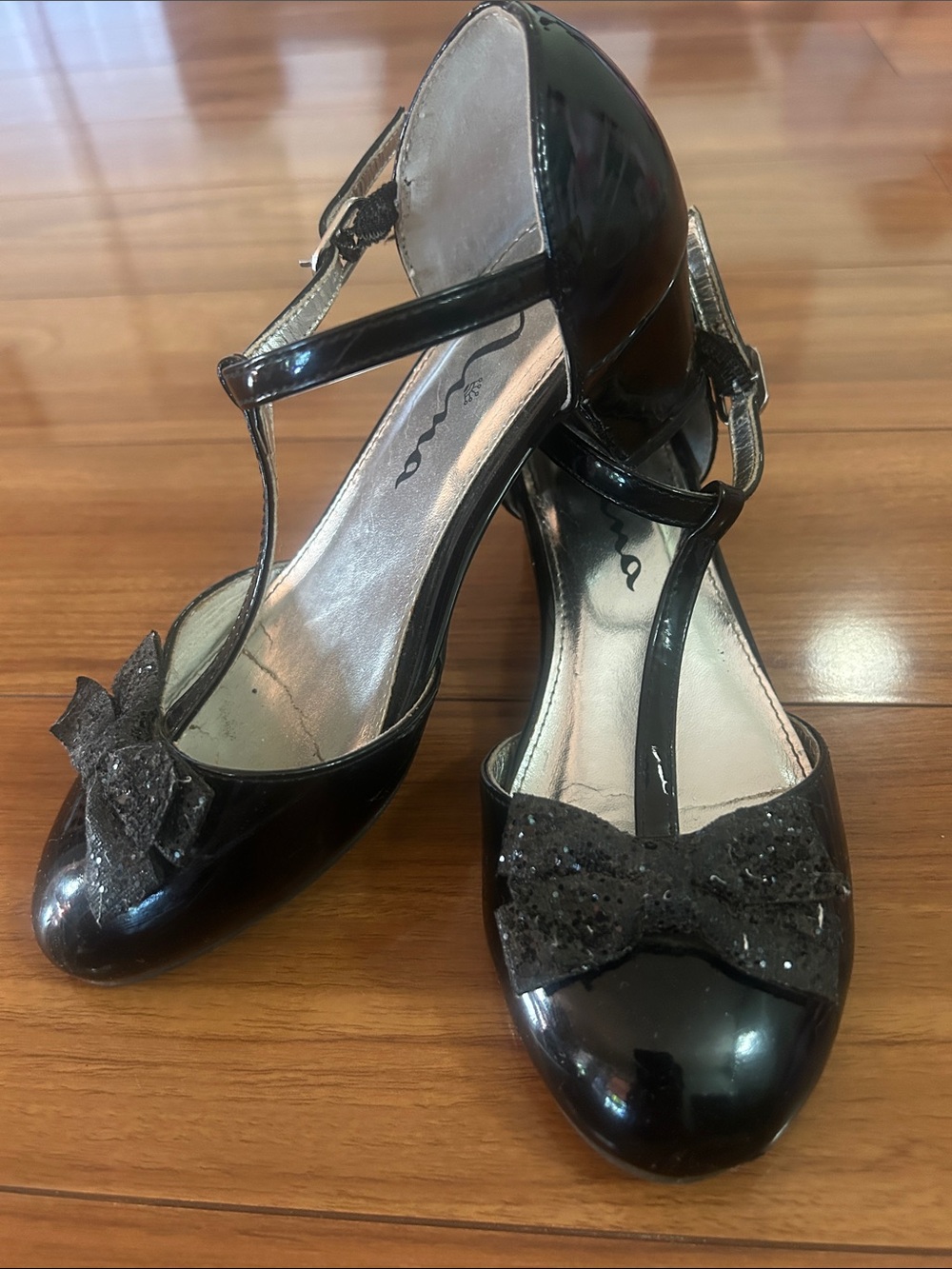 Nina Black Patent T-Strap Heels with Sequin Bow